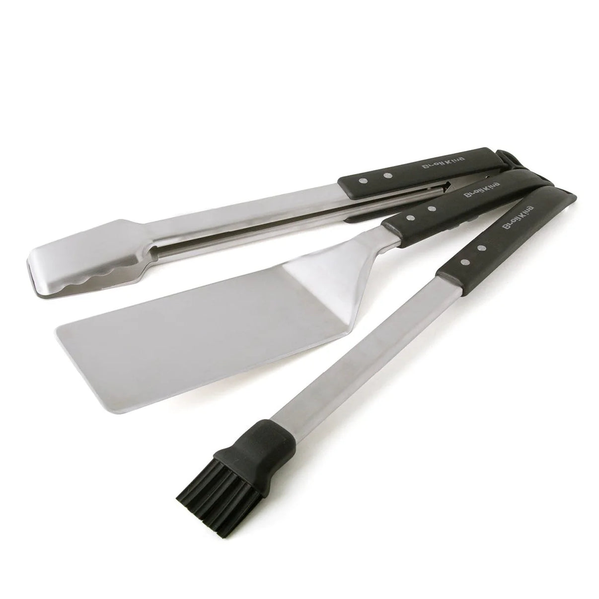 Set of three metal barbecue tools with black handles on a white background